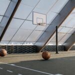 What is PVC flooring used for in sports courts?